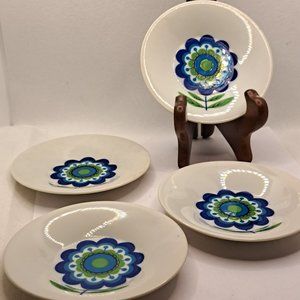 Four Japan vintage retro demitasse plates.